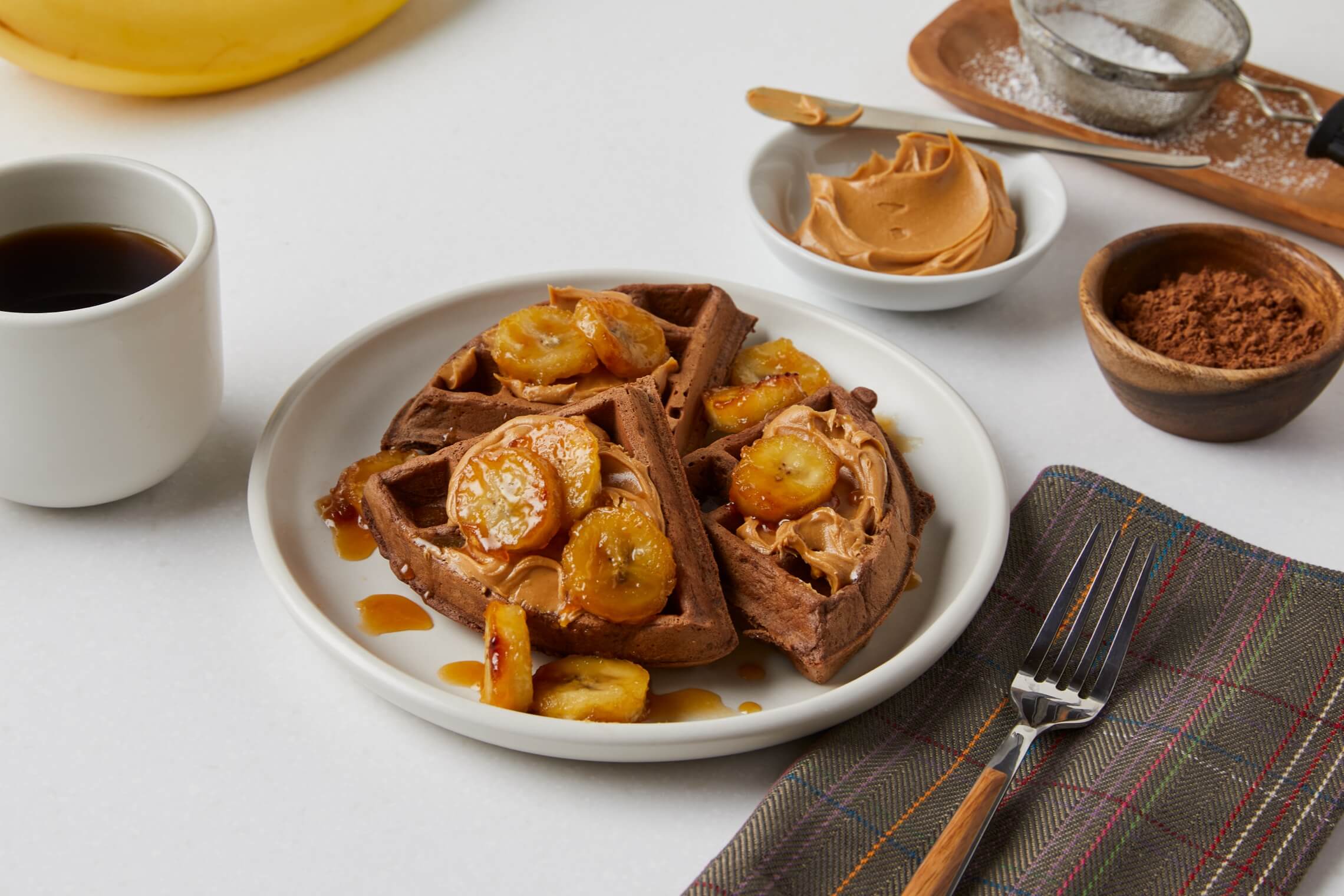Chocolate Waffles with Peanut Butter and Caramelized Bananas